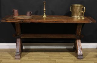 A 17th century style oak tavern or refectory table, rectangular top, X-frame supports, 71cm high,