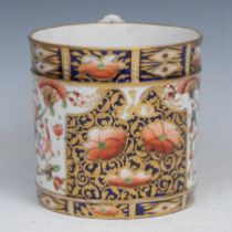 An early 19th-century Derby porter mug, painted and gilded in the Imari palette, 11.5cm high, crown,