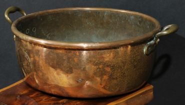 A large 19th century copper two handled pan, roll top, heavy gauge, 53cm over brass handles