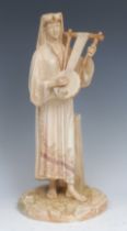 A Royal Worcester figure, of a Egyptian musician, modelled by James Hadley, the figure in Eastern