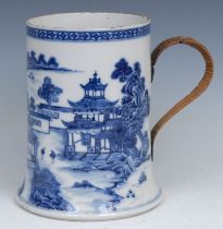 A Chinese blue and white Bridge pattern porter mug, painted with bridge, pagodas, figures and trees