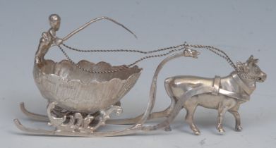 An early 20th century Dutch silver novelty table decoration or sweetmeat dish, as a putto driving