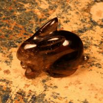 Alfred Lyndhurst Pocock (1882 - 1962), a brown quartz carving, of a rabbit, unsigned, 4cm long