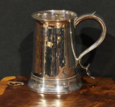 A George III silver mug, flared rim, scroll handle, skirted base, 14cm high, Peter & Ann Bateman