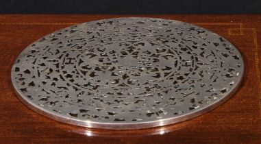 An American silver circular table coaster, the mount pierced and engraved with bands of scrolling