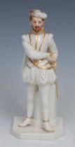 A rare Royal Worcester figure, after James Hadley, Sir Walter Raleigh, standing holding his sword,