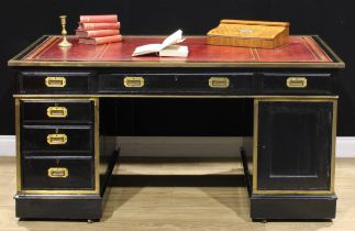 A 19th century campaign type brass mounted ebonised twin pedestal desk, rectangular top with inset