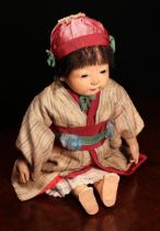 A Japanese gofun Ichimatsu traditional play doll, the gofun head head with inset fixed eyes and