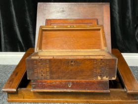 An early 20th century mahogany and pine desk box, hinged cover enclosing stationery or