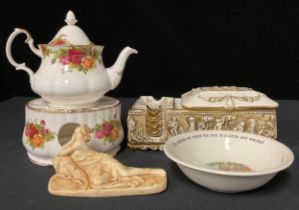 A Capodimonte box; a Royal Albert teapot and stand; an Adams bowl; a reclining figure