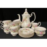 A Royal Albert Moss Rose pattern coffee set, comprising coffee pot, six coffee cups and saucers,