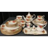 A Royal Albert Old Country Roses pattern teapot, milk jug and sugar bowl, six teacups, saucers and