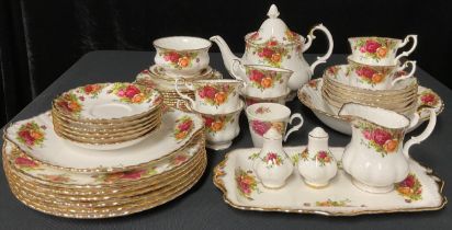 A Royal Albert Old Country Roses pattern teapot, milk jug and sugar bowl, six teacups, saucers and