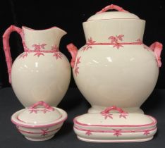 A late 19th/early 20th century Staffordshire wash jug, water pail and cover, soap dish and