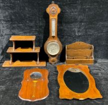 An oak wall hanging aneroid wheel barometer, with thermometer, 62cm; an Edwardian inlaid mahogany