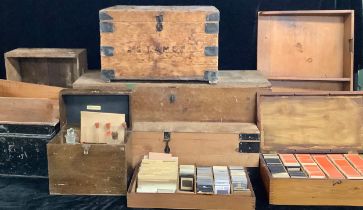 A collection of pine boxes; a small tin trunk; a crate; a sliding drawer; another double drawer;