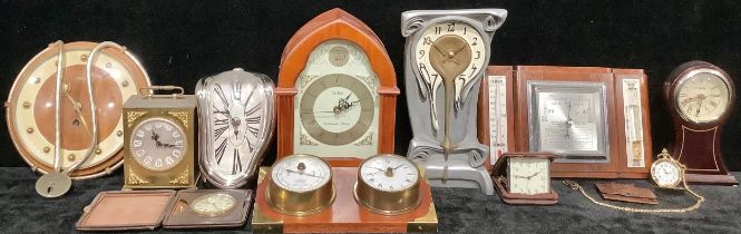 Clocks - a mid-20th century German treen Kenzle porthole clock; a novelty moulded resin "melting"