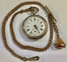 An 800 silver pocket watch, on gold plated double Albert with carnelian fob