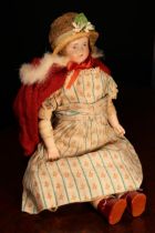 A 19th century bisque shoulder head doll, the bisque shoulder head with painted features including