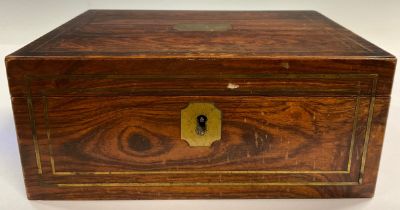 A Regency rosewood and brass inlaid rectangular work box, fitted interior, c.1820