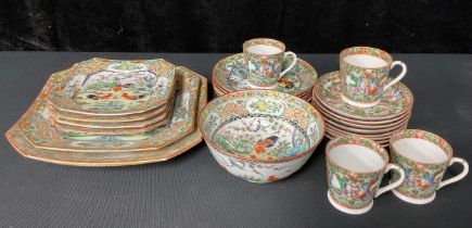 A Chinese porcelain part tea service comprising plates, cups, etc