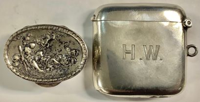 A hallmarked silver vesta case; an oval 800 silver pill box