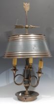 A French Empire style brass and green painted bouillote lamp, arrow cresting, dished base, 78cm