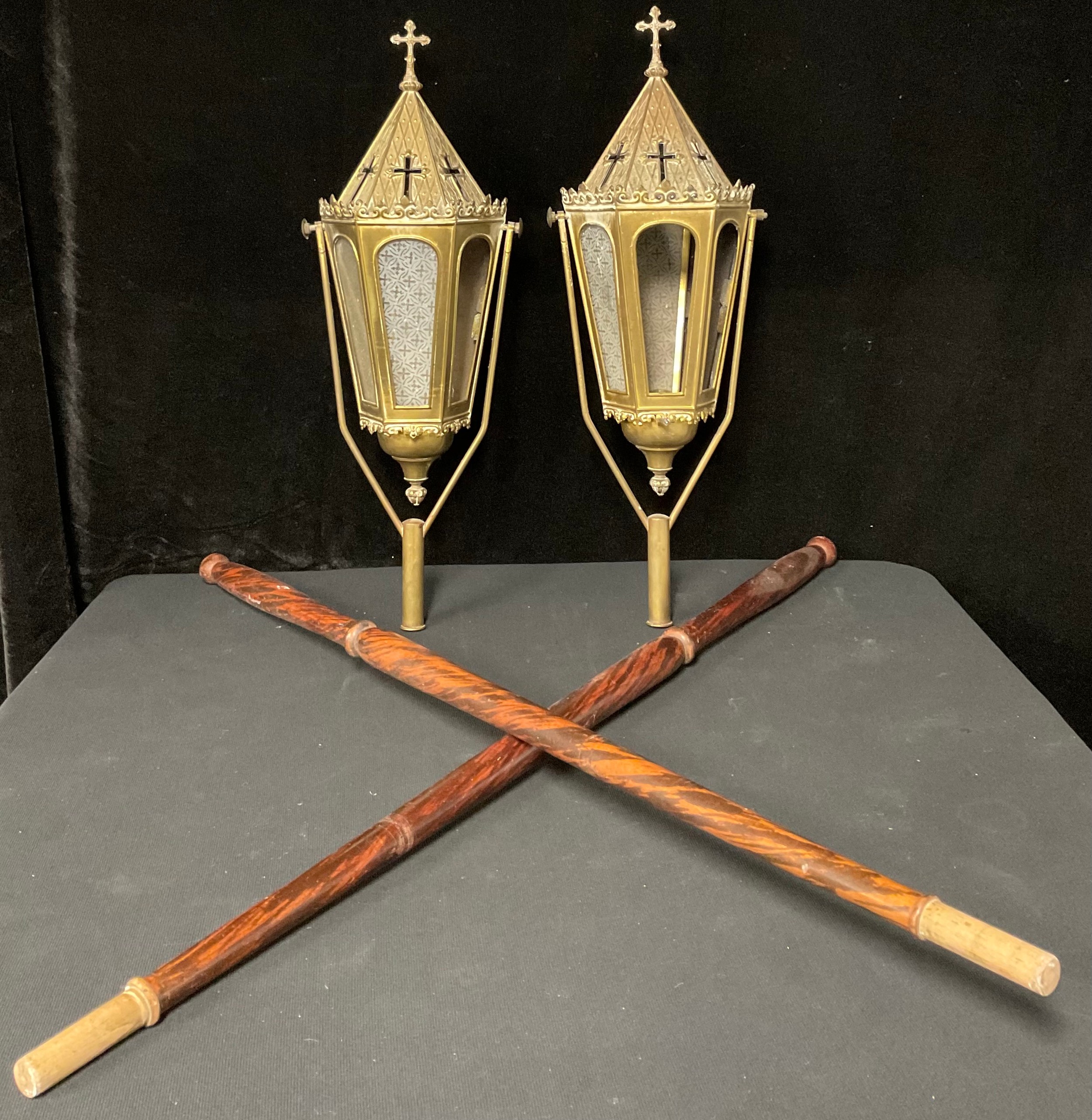 Two ecclesiastical lanterns on poles