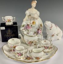 A Royal Crown Derby Posies pattern miniature teapot, milk jug and sugar bowl, tea cup and saucer, on