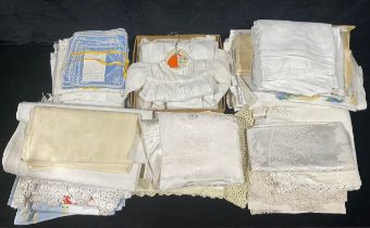 Textiles - an early 20th century white cotton christening gown, lace trimmed; a similar hand knitted
