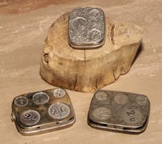 An early 20th century sprung five-section pocket coin holder, for 2/6 to 6d, 7cm wide; others (3)