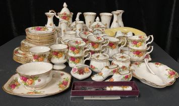 A Royal Albert Old Country Roses pattern telephone, mantel clocks, assorted vases, coffee pot, six