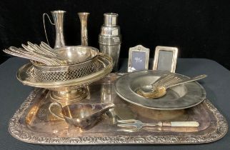 A silver plated rounded rectangular tray, an EPNS cocktail shaker, a set of pastry forks, a set of