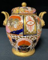 An early 19th century Imari jar and cover with inner lid