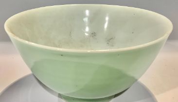 A Chinese circular celadon bowl, 13cm diameter