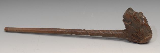 A large Black Forest pipe, the bowl carved with a sportsman and his dog, 44cm long, c.1880