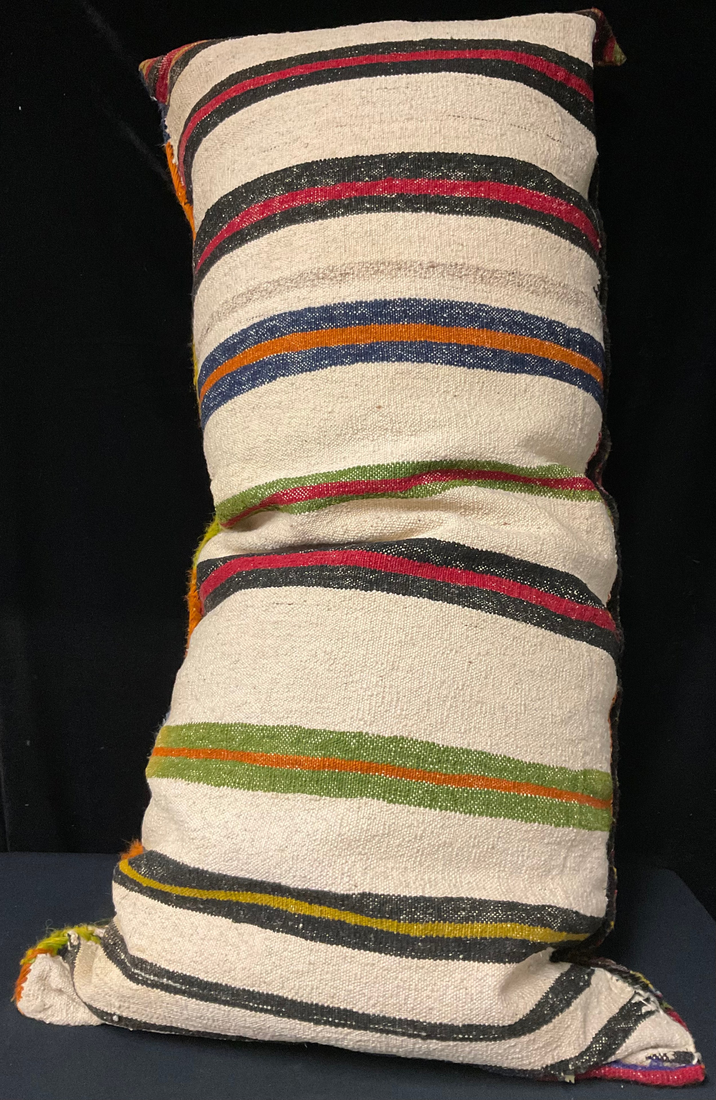 A Middle Eastern woollen floor cushion, 110cm long - Image 2 of 2