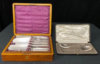 Two silver seal top spoons; a set of 12 fish knives and folks (2)