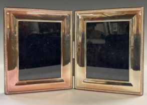 An Elizabeth II silver diptych double photograph frame, Sheffield 1998