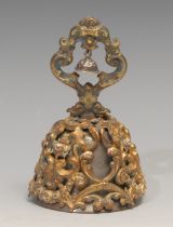 A 19th century gilt metal and enamel table bell, cast and embossed with a profusion of flowers and