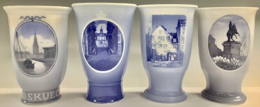 A near pair of Royal Copenhagen Rundskuedag (Upside Down Day) commemorative beaker vases, 1932 and