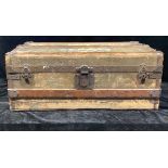 A Victorian wood and iron bound steamer trunk, brass lock, Eagle Lock Co. 1877, bearing labels, 83cm