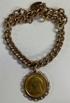 A sovereign, 1900, mounted on a 9ct gold curb link bracelet