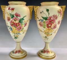 A pair of Royal Worcester blush ivory Floral Mist pattern pedestal two handled vases, painted with