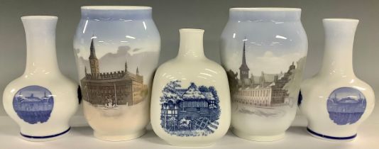 A pair of Royal Copenhagen Rundskuedag (Upside Down Day) commemorative bottle vases, 1917, number