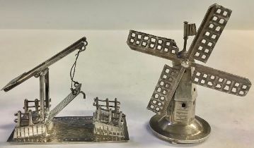 Two miniature Dutch silver windmill and canal bridge