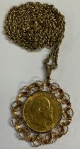 A sovereign, 1907, mounted with a 9ct gold fancy link necklace