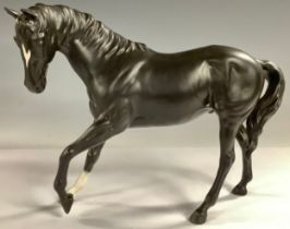 A Beswick horse model, Black Beauty, with white blaze and sock, matt glaze, 18cm