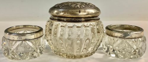 A pair of silver mounted salts, Chester 1948; an Art Nouveau silver topped jar, Birmingham 1913