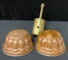 A Victorian brass roasting jack; two copper jelly moulds